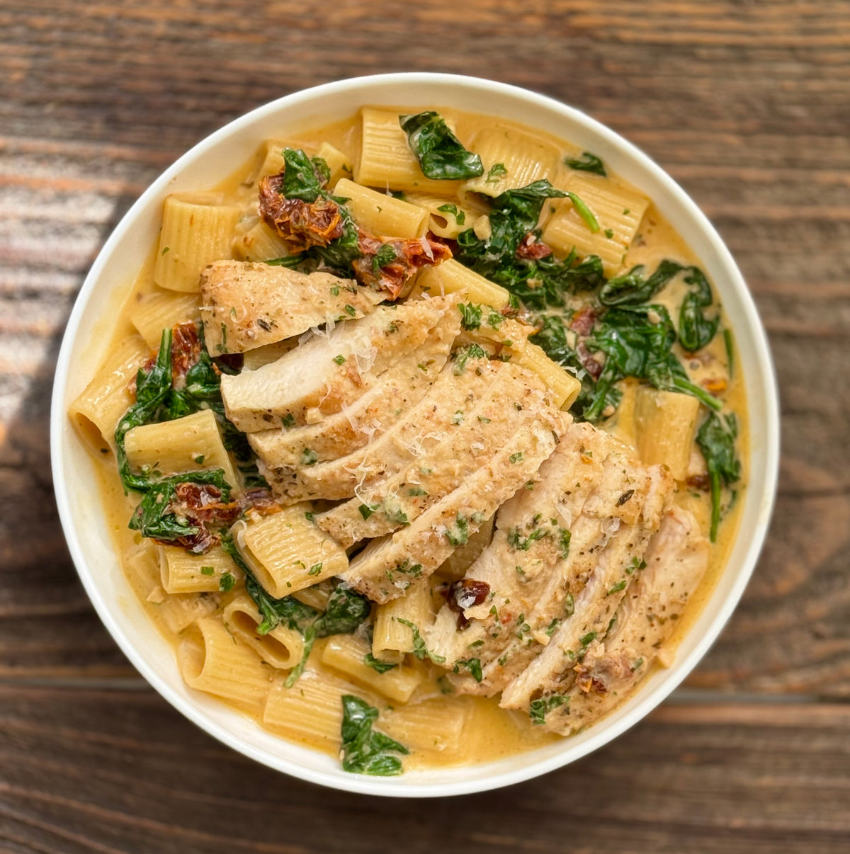 Creamy Tuscan Chicken over Pasta
