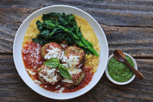 Italian Eggplant Balls over Polenta with Broccoli Rabe
