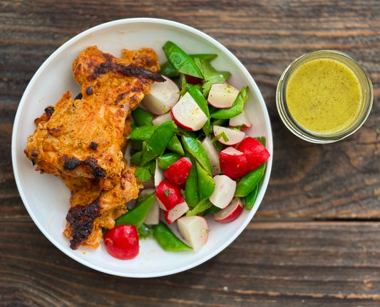 Harissa Chicken Thighs with Snap Pea Salad
